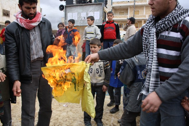 Burning of Hizballah flag in northern Syria
